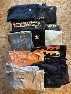 X12 branded tank tops XL. Champion, Levi’s, Billabong, ADIDAS, Brixton, etc…